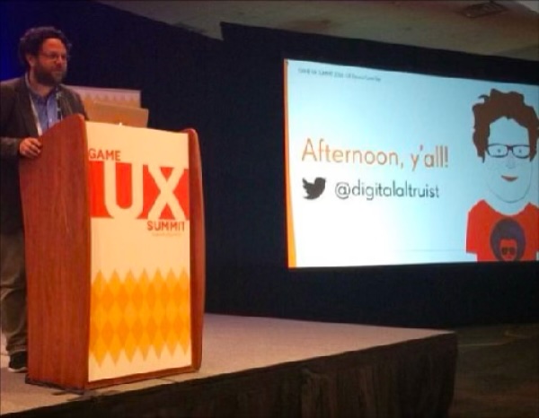 Christopher Grant speaking at Game UX Summit